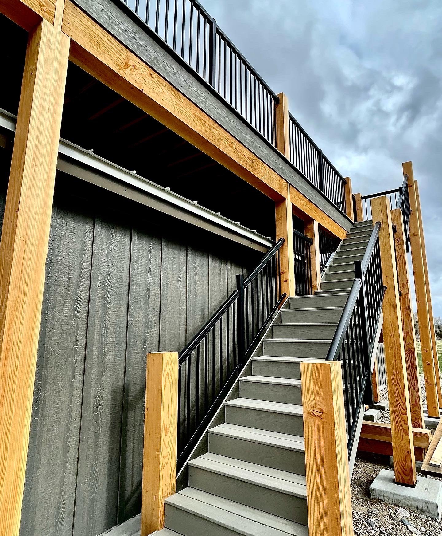 Barndominium in southwest Montana near river custom home builder staircase